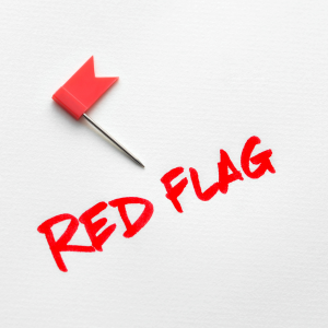 Een kleine rode vlag met de tekst "red flag".