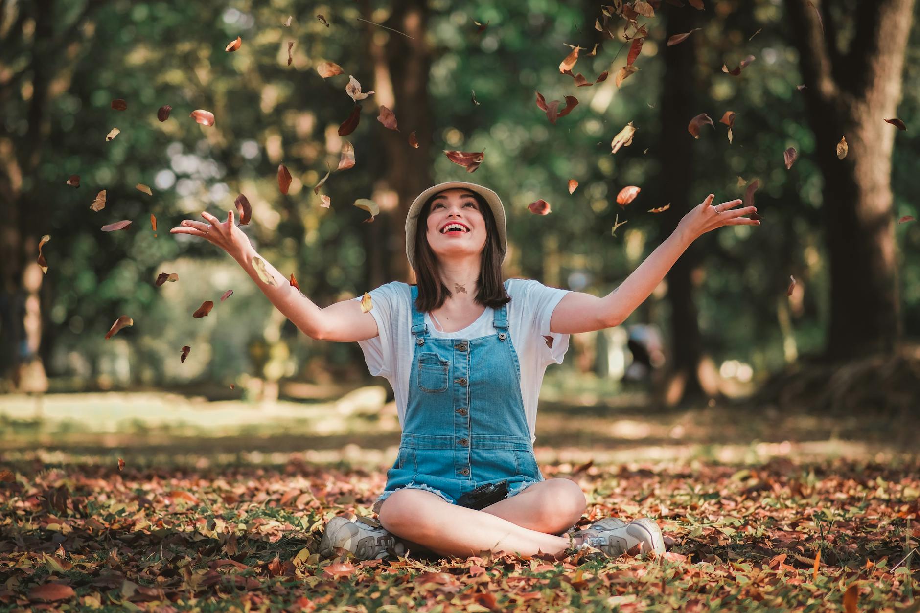 photo of woman wearing denim jumpers